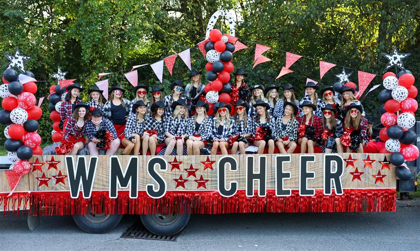Students participate in homecoming parade